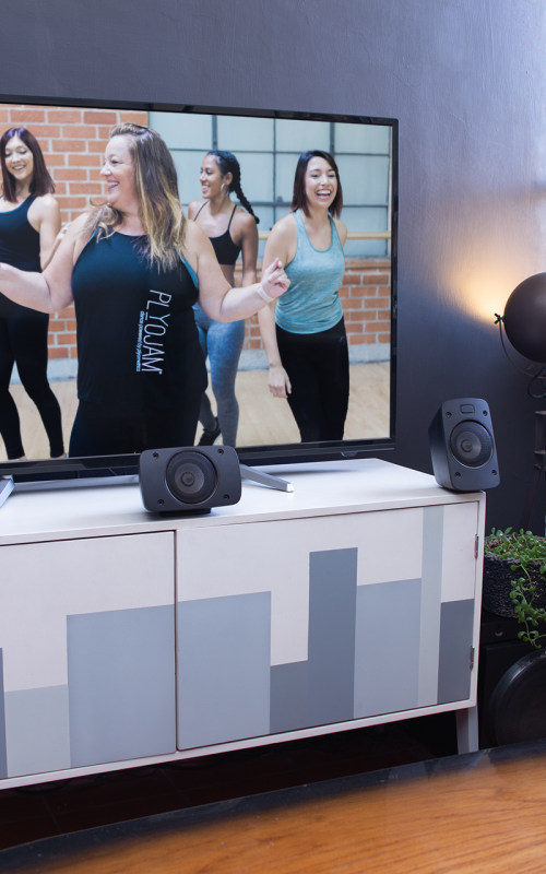 mockup-of-a-flat-screen-smart-tv-with-a-sound-system-25877 (1)